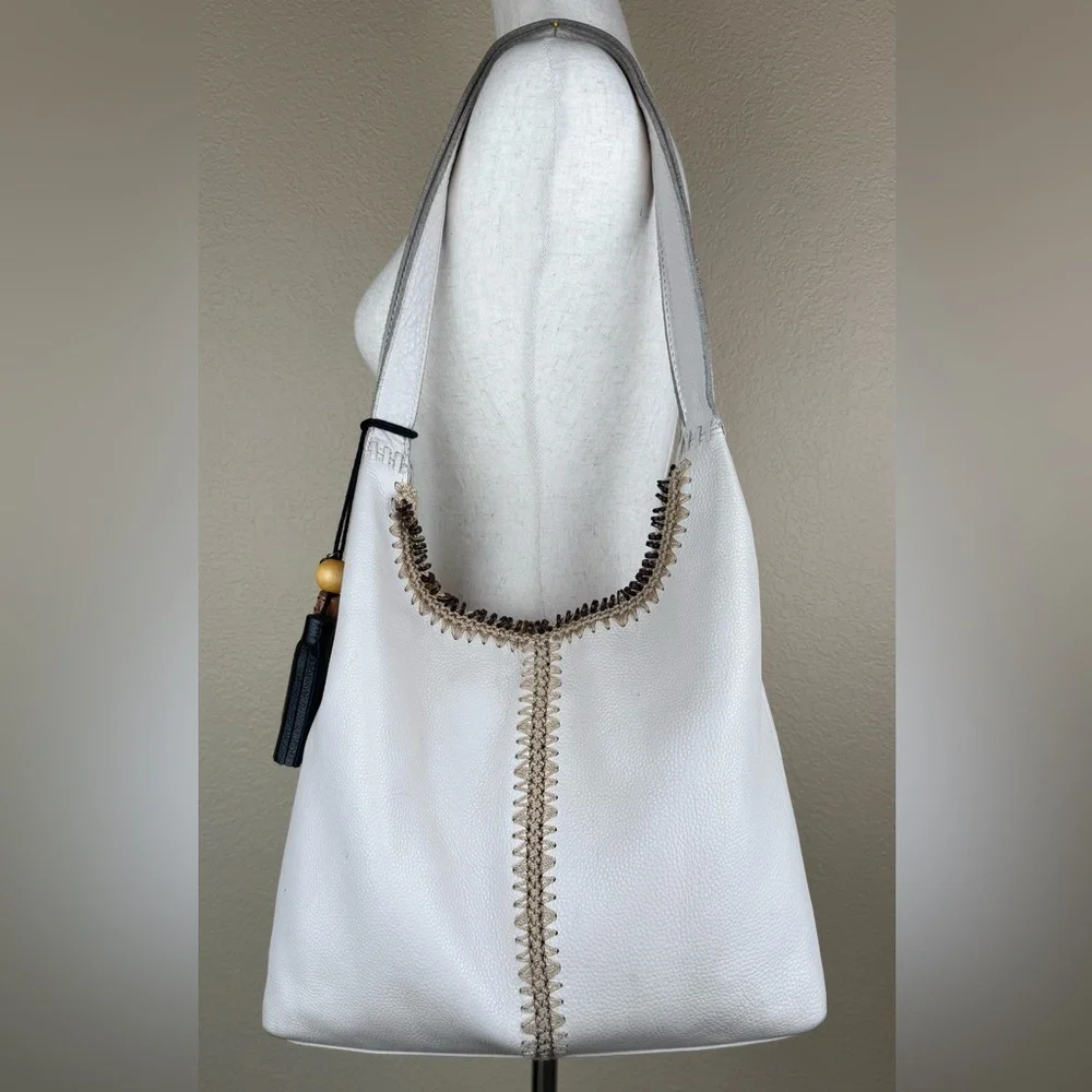 The Sak Huntley Hobo Bag. Ecru.Soft, Pebbled Leather w/Fabric Turquoise Interior - Picture 10 of 16